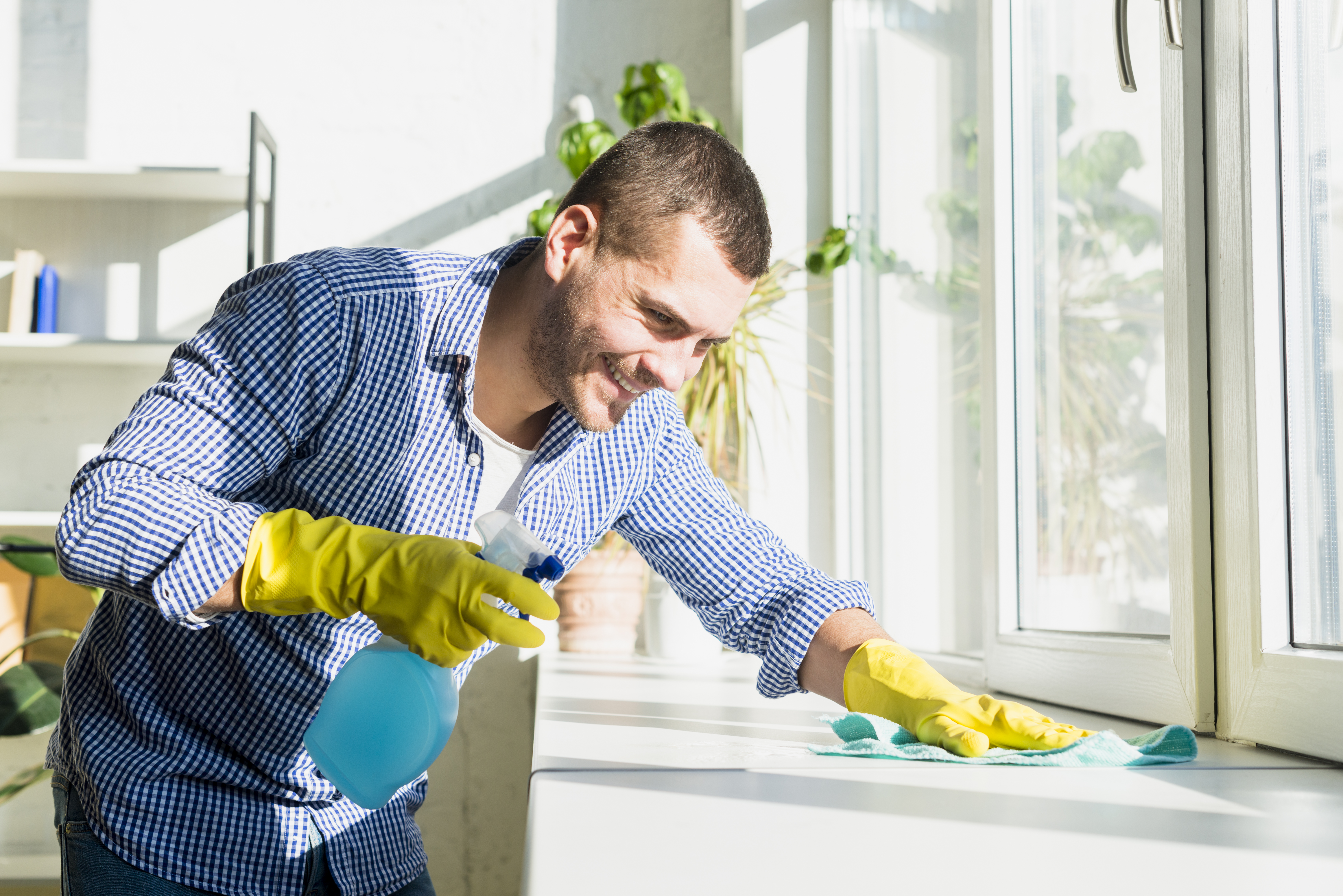 man cleaning his home (4)