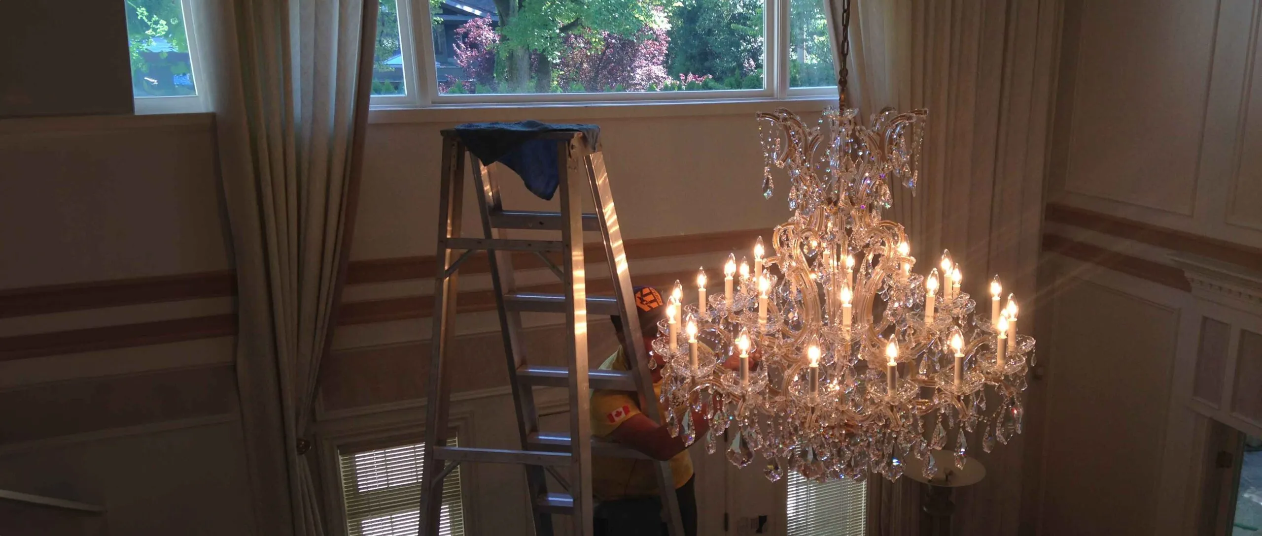 professional chandelier fixing services in dubai