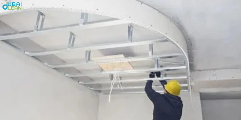 False ceiling repair in progress by experienced technician